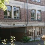 Vandalisme aan leegstaand oud atheneum in Sint-Truiden. “Ze kruipen hier zo over het muurtje”